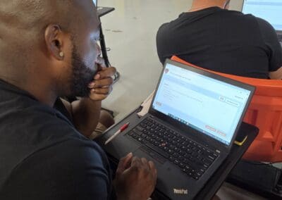 Houston Crane Operator Classroom Training - July, 2025 (student using laptop for training)